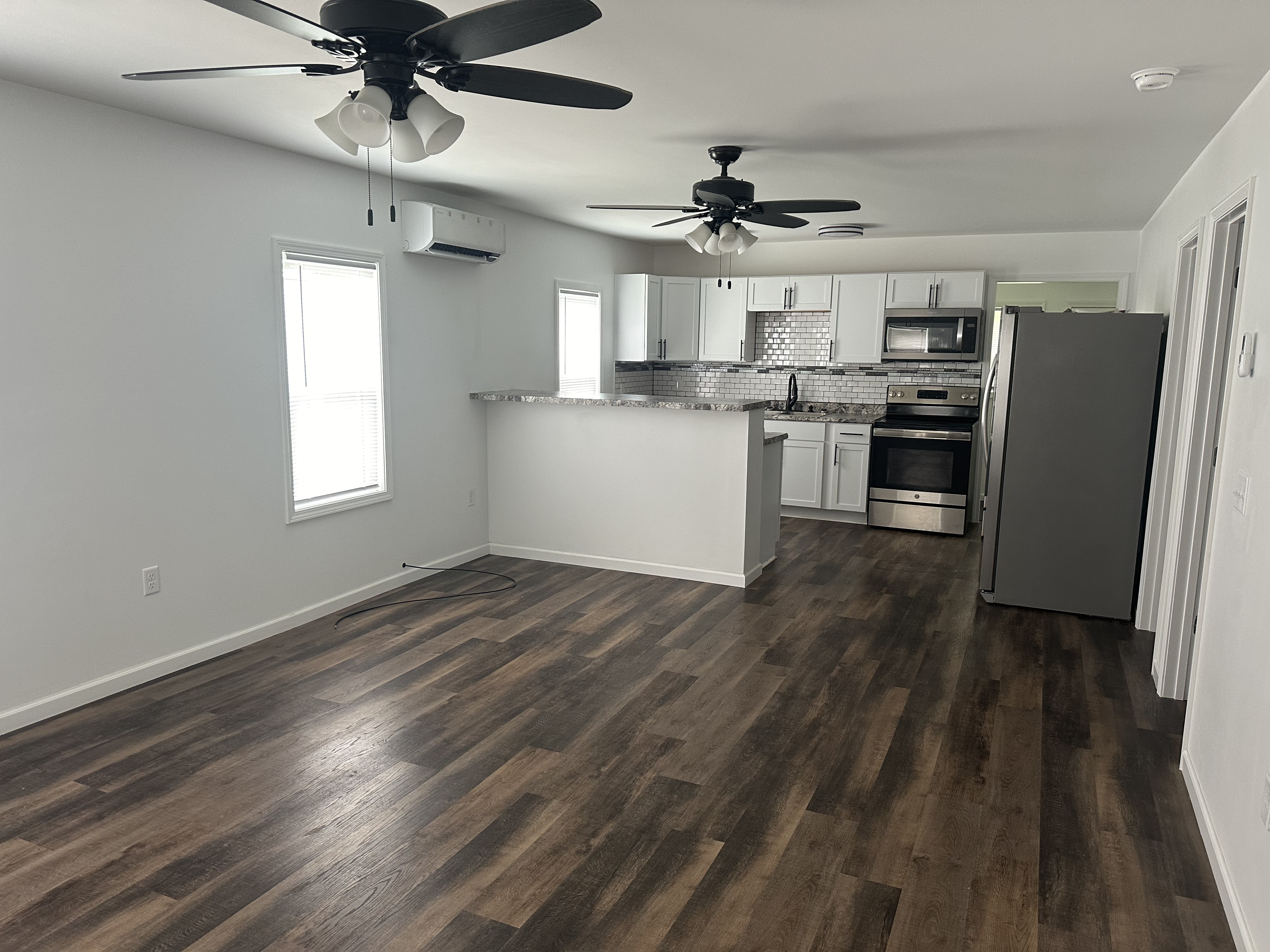 Marion Ohio home interior after renovation by McDonald and Sons &mdash; finished open kitchen and living space